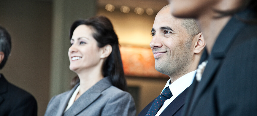 Business professionals attending a corporate gathering, illustrating the FINcredible company.