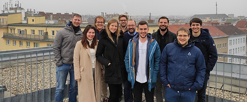FINcredible team group photograph on a rooftop in 2019.